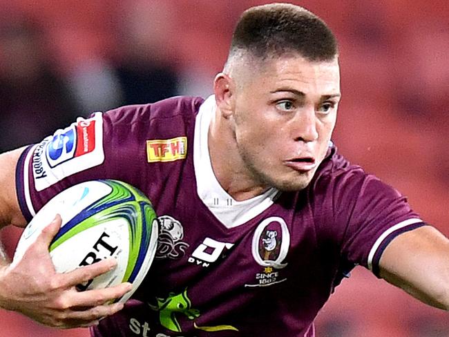 BRISBANE, AUSTRALIA - JULY 03: James O'Connor of the Reds attempts to break away from the defence during the round 1 Super Rugby AU match between the Queensland Reds and the New South Wales Waratahs at Suncorp Stadium on July 03, 2020 in Brisbane, Australia. (Photo by Bradley Kanaris/Getty Images)