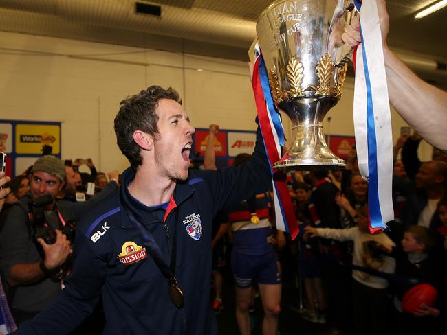 2016 AFL Grand Final match between the Western Bulldogs and the Sydney Swans at the Melbourne Cricket Ground (MCG), Melbourne, Australia on October 1, 2016. Bob Murphy with the premiership cup in the Bulldog rooms Picture :Wayne Ludbey