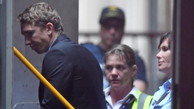 Prison officers escort Richard Vincec into a prison van after his sentencing today. Picture: AAP