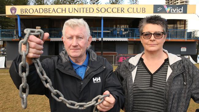 The president of the Broadbeach Soccer Club Michael Doyle and Secretary Ren Shennan have even tried extra chains and padlocks to no avail. Picture: Glenn Hampson