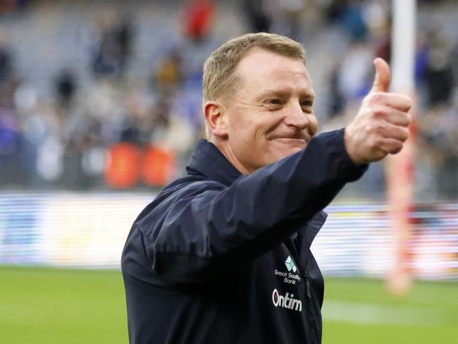 PERTH, AUSTRALIA - AUGUST 18: Michael Voss, Senior Coach of the Blues gives a thumbs up to the crowd after the win during the round 23 AFL match between West Coast Eagles and Carlton Blues at Optus Stadium, on August 18, 2024, in Perth, Australia. (Photo by James Worsfold/Getty Images)