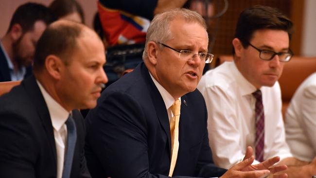 Josh Frydenberg, Scott Morrison and David Littleproud discuss recovery efforts this week. Picture: AAP