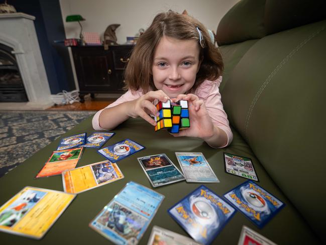 Ms Manousakis said card games and puzzles help educate her kids while still allowing them to have fun. Picture: Tony Gough