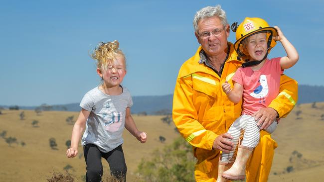 Rod O'Connell, 64 with grandkids Holly Mitchell, 5 and Chloe Mitchell, 3. Picture: Jason Edwards