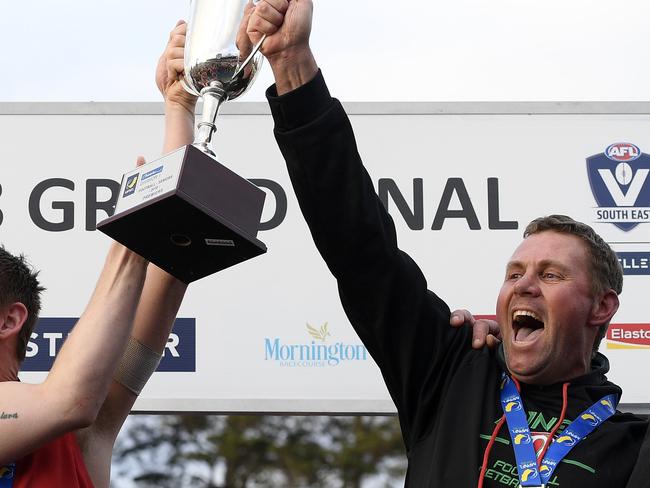 The Pines celebrate after winning the MPNFL Division 1 grand final between The Pines and Sorrentoin Frankston, Sunday, Sept. 16, 2018. Picture: Andy Brownbill)