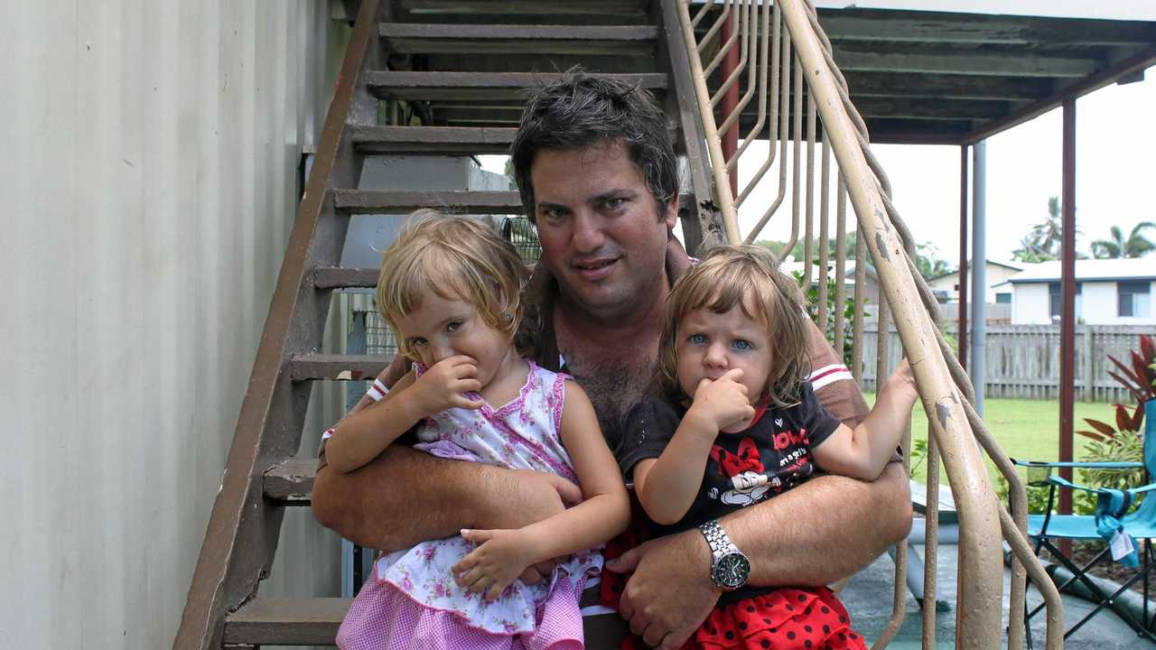 Sole parent Derek Fenech, with his daughters Amelio, 2, and Katherine, 1, is desperate to find a home for his family of four in Mackay. Picture: Kieran Moran