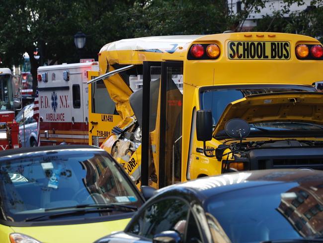 The man appears to have smashed into a school bus. Picture: AP