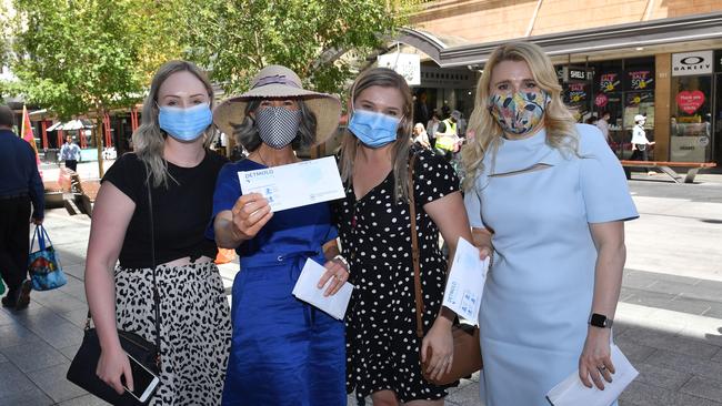 Nicola Spurrier hands out masks in Adelaide. Picture: Keryn Stevens.