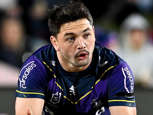 SUNSHINE COAST, AUSTRALIA - JUNE 19: Brandon Smith of the Storm passes the ball during the round 15 NRL match between the Melbourne Storm and the Wests Tigers at Sunshine Coast Stadium, on June 19, 2021, in Sunshine Coast, Australia. (Photo by Bradley Kanaris/Getty Images)