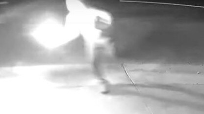 Man caught on camera throwing molotov cocktail at Novar Gardens house. Picture: SA Police