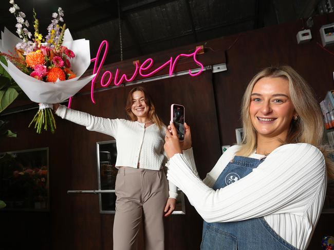 Geelong Flower Farm social media guru Paige Beekmans and manager Rebecca Dickson. Geelong businesses are taking advantage of TikTok to grow this customer base. Picture: Alan Barber