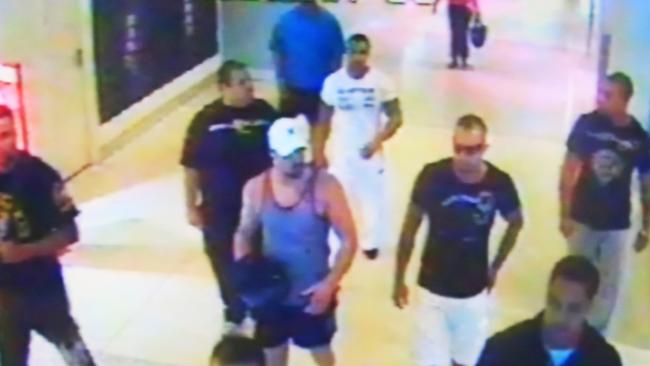 CCTV footage of the bikie gang members at Sydney Airport domestic terminal as they stride toward the fight in 2009.