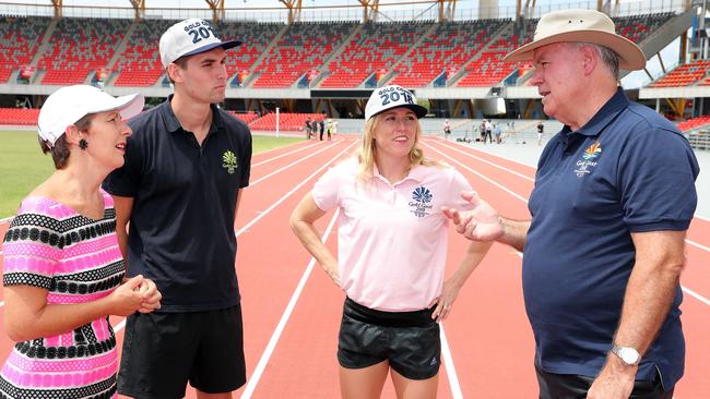 Acting Minister for the Commonwealth Games Di Farmer, decathlete Cedric Dubler, Sally Pearson and Games CEO Mark Peters at the new track. Photo by Richard Gosling