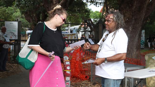 Wayne Wharton hands out material at the Marrickville market. Picture: John Feder/The Australian