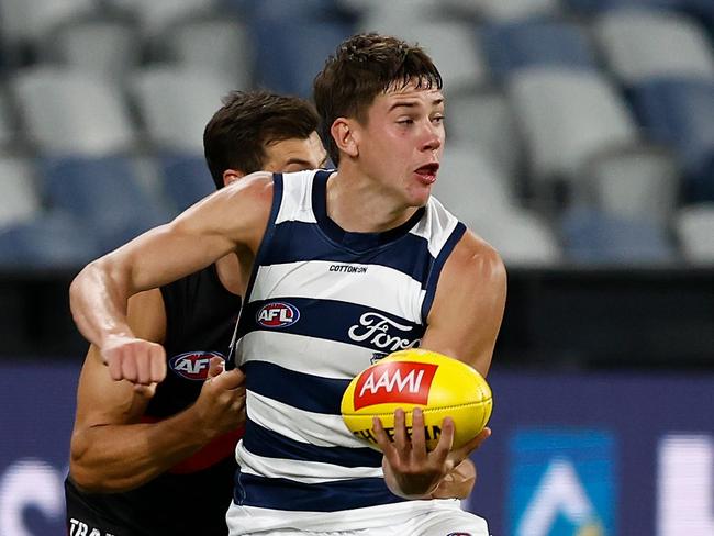 Connor O'Sullivan looks for an option in the AFL game. Picture: Michael Willson/AFL Photos via Getty Images