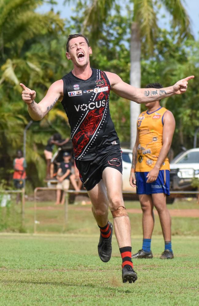 Tiwi Bombers' Sam Darley celebrates his side's win at Wurrumiyanga Oval in Round 9 of the 2023-24 NTFL season. Picture: Tymunna Clements / AFLNT Media