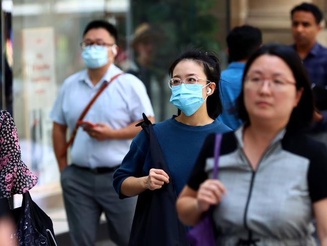 BRISBANE, AUSTRALIA, NCA NewsWire Queensland residents have been asked to start wearing masks again as the forth wave of Covid 19 start putting pressure on the public health system, Mask and none mask wearing in the Brisbane CBD Picture NCA NewsWire David Clark