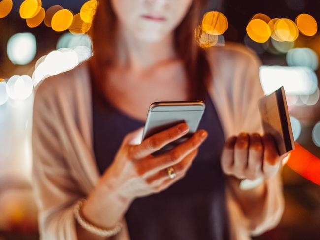 Young woman phoning the bank for credit card support   istock image