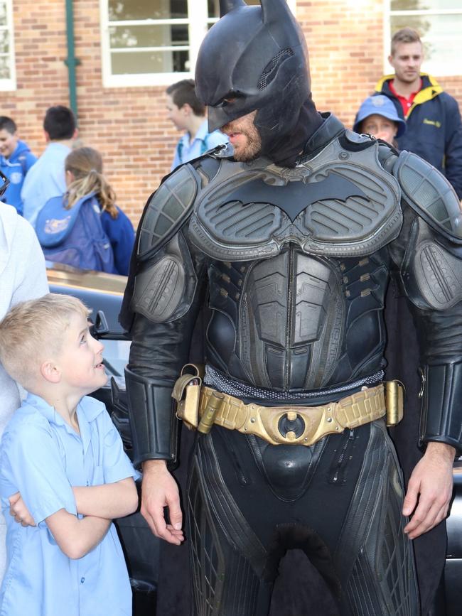 Batman chats to a surprised Finn O'Donovan