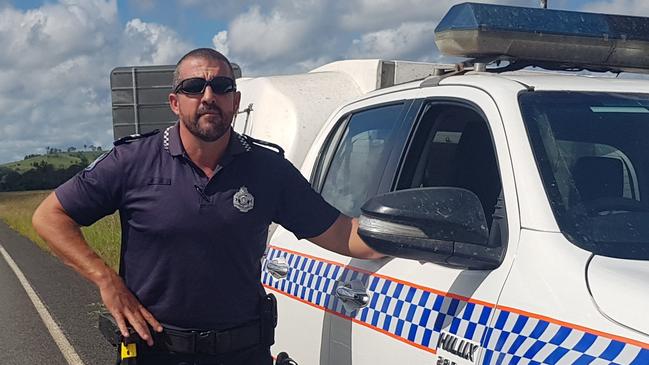 Acting Sergeant Bill Greer was helped by an off-duty Queensland Fire and Rescue Service during a violent struggle during an arrest. Photo: Police Media