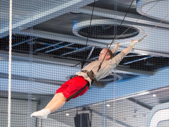 Guests can polish up their trapeze skills at Ovation of the Seas’ circus school.