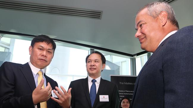 Songcheng Group Chairman Qiaoling Huang talking with Chinese Consul-General Dr Yongchen Zhao and Mayor Tom Tate. Picture Glenn Hampson