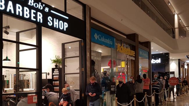 Shoppers at Ringwood's Eastland waited for up to two hours for a haircut after salons reopened on October 19. Picture: Kiel Egging.