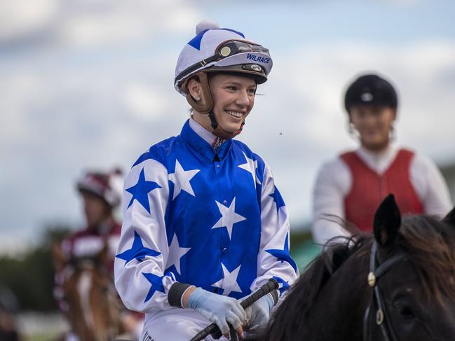 Stephanie Thornton rides The Odyssey to victory in race 7, the QTIS Jewel 3YO, during the QTIS Jewel Raceday at Aquis Park on the Gold Coast, Saturday, March 14, 2020. (AAP Image/Glenn Hunt)