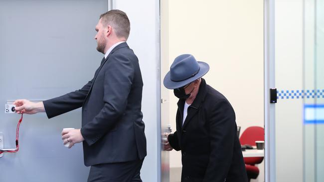 Robert Silkman enters a police station interview room to testify at the trial of Chris Dawson. Picture NCA NewsWire / David Swift