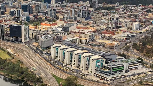 The Adelaide BioMed City precinct on North Terrace. Together the Royal Adelaide Hospital, South Australian Health and Medical Research Institute, University of Adelaide Health and Medical Sciences Building and UniSA Cancer Research Institute represent a $3.2 billion investment in the site. Credit: Raymond Spencer