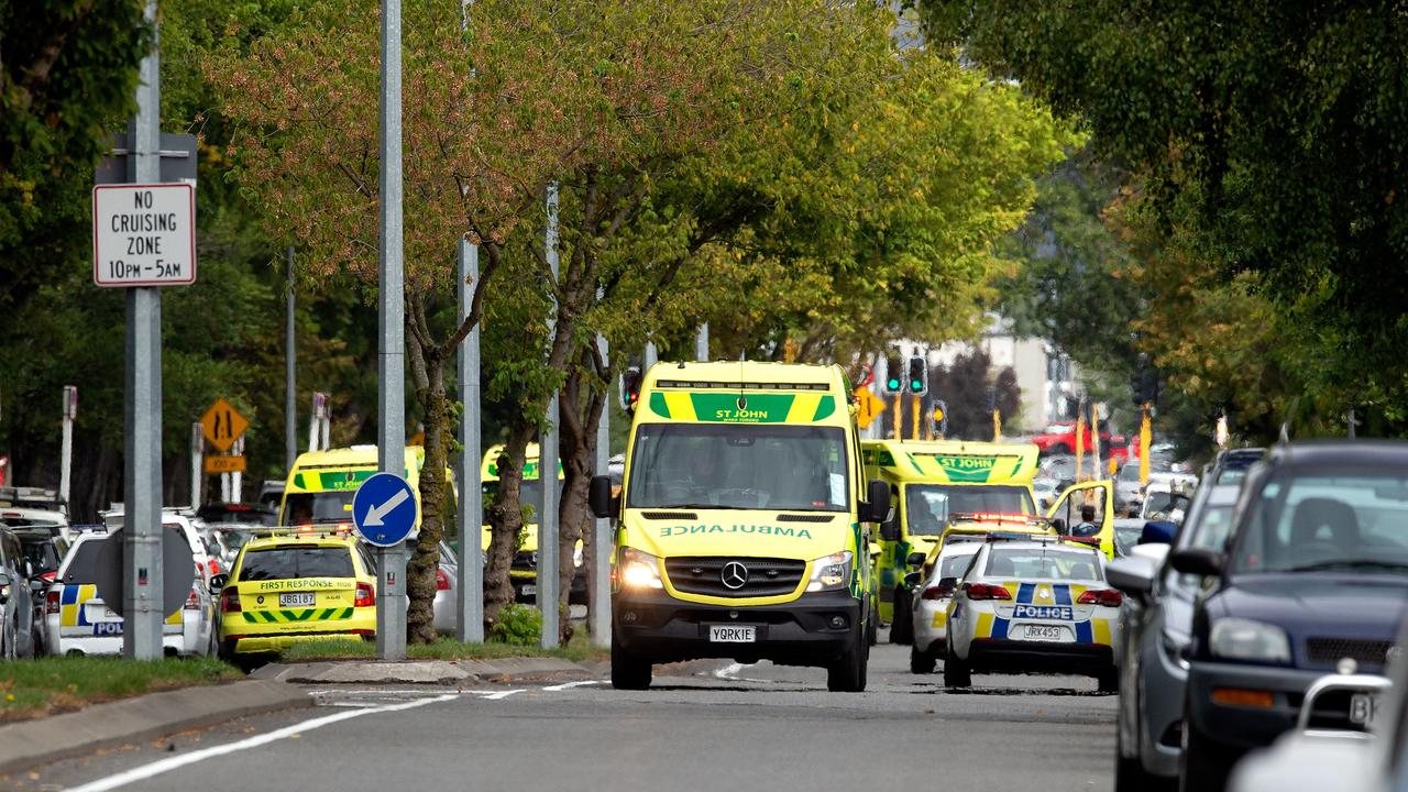 Emergency services are seen rushing to the scene of a shooting at the Masjid Al Noor mosque in Christchurch. Picture: AAP