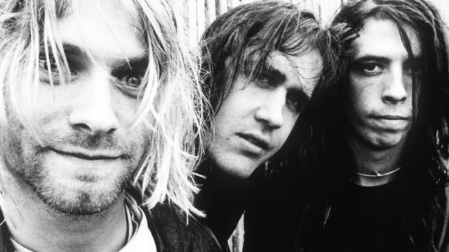 Dave Grohl, right, with Kurt Cobain and Krist Novoselic during their Nirvana days. Picture: Supplied.
