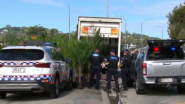 Police officers at a truck stopped in Elanora on the Gold Coast which they say was found to be carrying cannabis. Picture: Nine Gold Coast News