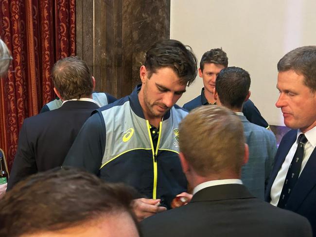 Pat Cummins signs autographs. Picture: Sophie Elsworth