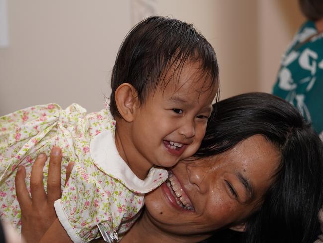 Previously conjoined twin Nima and her mum Bhumchu Zangmo. Picture: AAP/Stefan Postles