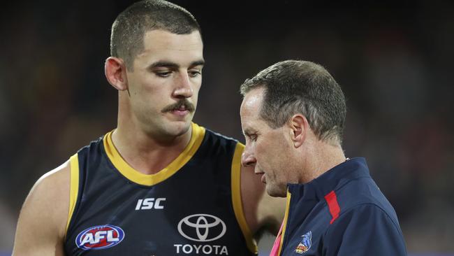 Co-captain Taylor Walker chats with coach Don Pyke at three quarter time on Saturday. Picture: Sarah Reed