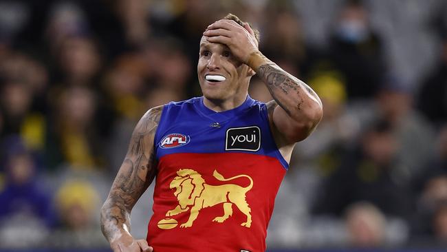 MELBOURNE, AUSTRALIA - JULY 31: Mitch Robinson of the Lions reacts after missing a goal during the round 20 AFL match between the Richmond Tigers and the Brisbane Lions at Melbourne Cricket Ground on July 31, 2022 in Melbourne, Australia. (Photo by Darrian Traynor/Getty Images)