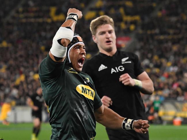 TOPSHOT - South Africa's Cheslin Kolbe celebrates a try during the Rugby Championship match between the New Zealand All Blacks and South Africa at Westpac Stadium in Wellington on September 15, 2018. (Photo by Marty MELVILLE / AFP)