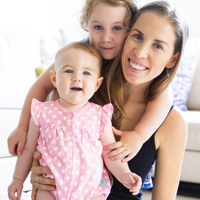 Pam Fernandes with daughters Sophie, 3, and Mallie, 10 months. Picture: Lachie Millard