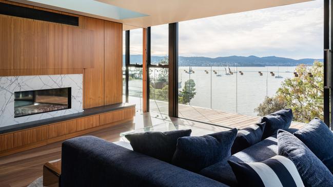 The luxe living room in The Finish Line’s 'Hobart' apartment overlooking the River Derwent. Picture: ADAM GIBSON