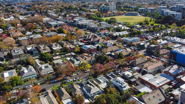 Aerial view of houses in Armadale, looking towards the Melbourne city skyline.