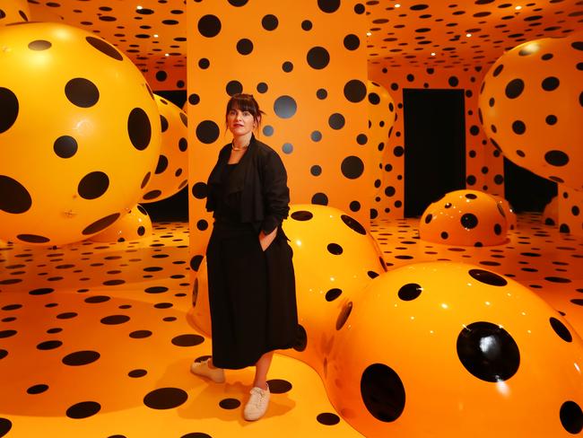 Nicole Durling Mona Co-Director of Exhibitions and Collections with artwork Dots Obsession Tasmania by Japanese artist Yayoi Kusama. New exhibition at Mona On the Origin of Art to open. Picture: NIKKI DAVIS-JONES