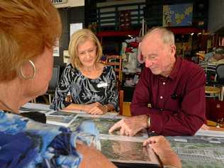 PLANS REVEALED: Sue Mason-Baker and Frank Lewins of the Sunshine Coast Hospice Charity check out the plans for the new premises in Buderim. Picture: John McCutcheon