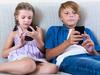 Young girl and boy on mobile phones. Picture: iStock