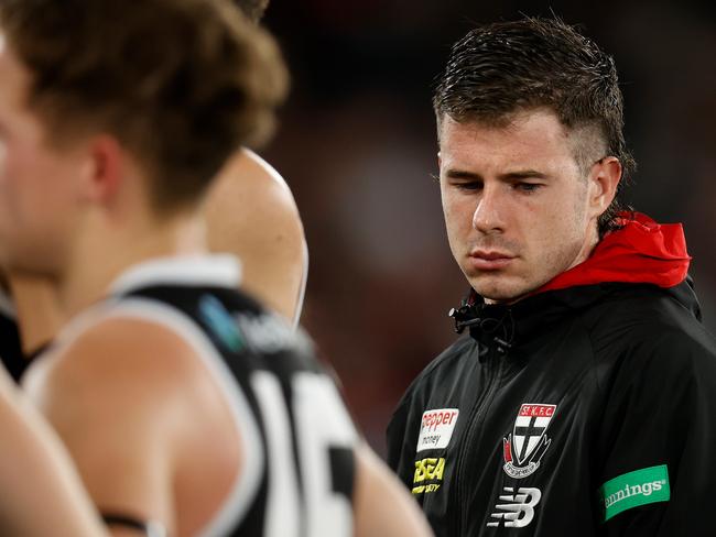 MELBOURNE, AUSTRALIA - MAY 14: Jack Higgins of the Saints looks on after being subbed out of the match with concussion during the 2022 AFL Round 09 match between the St Kilda Saints and the Geelong Cats at Marvel Stadium on May 14, 2022 in Melbourne, Australia. (Photo by Michael Willson/AFL Photos via Getty Images)