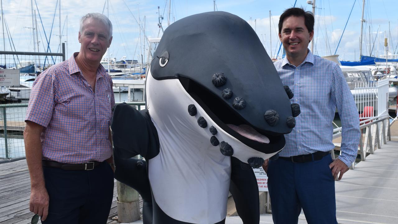 Fraser Coast Tourism and Events CEO Martin Simons and Fraser Coast Mayor George Seymour with Hervey the whale at the boat harbour. Photo: Stuart Fast