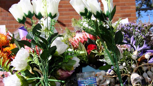 Flowers have been placed outside at Chinchilla Police Station as the community comes to terms with the terrible events from Monday when two officers were killed in cold blood. Picture: David Clark NCA/NewsWire