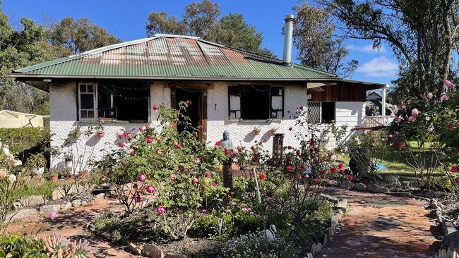 The front of the Applethorpe property with the couple’s prized roses untouched.