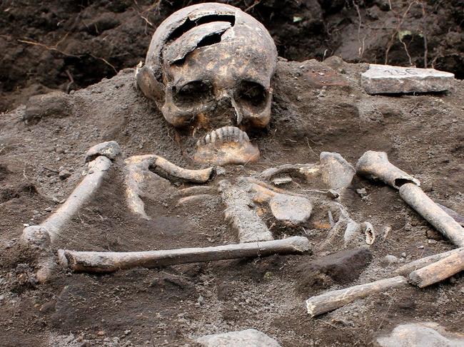 Mandatory Credit: Photo by REX (4189468c) 'Vampire' grave featuring a skeleton with an iron rod impaled through where the heart would have been Archaelogists discover 'vampire' graves, Bulgaria - 09 Oct 2014 Bulgarian achaelogists have discovered a number of so-called 'vampire' graves. The skeletons uncovered in the graves all have an iron rod impaled through their bodies where their hearts would have been. Dating back to the Middle Ages, they have been discovered at the site of the ancient Thracian temple of Perperikon, southeast of the Bulgarian capital Sofia. According to archaeologist Nikolai Ovcharov, who discovered the graves, the practice of pinning an iron bar through the chest was believed to stop the dead from becoming vampires. These are the sixth and seventh vampire graves discovered in the country for the past two years.