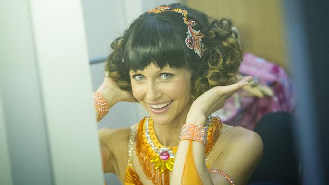 New look: Livinia donned a brunette wig for her role.